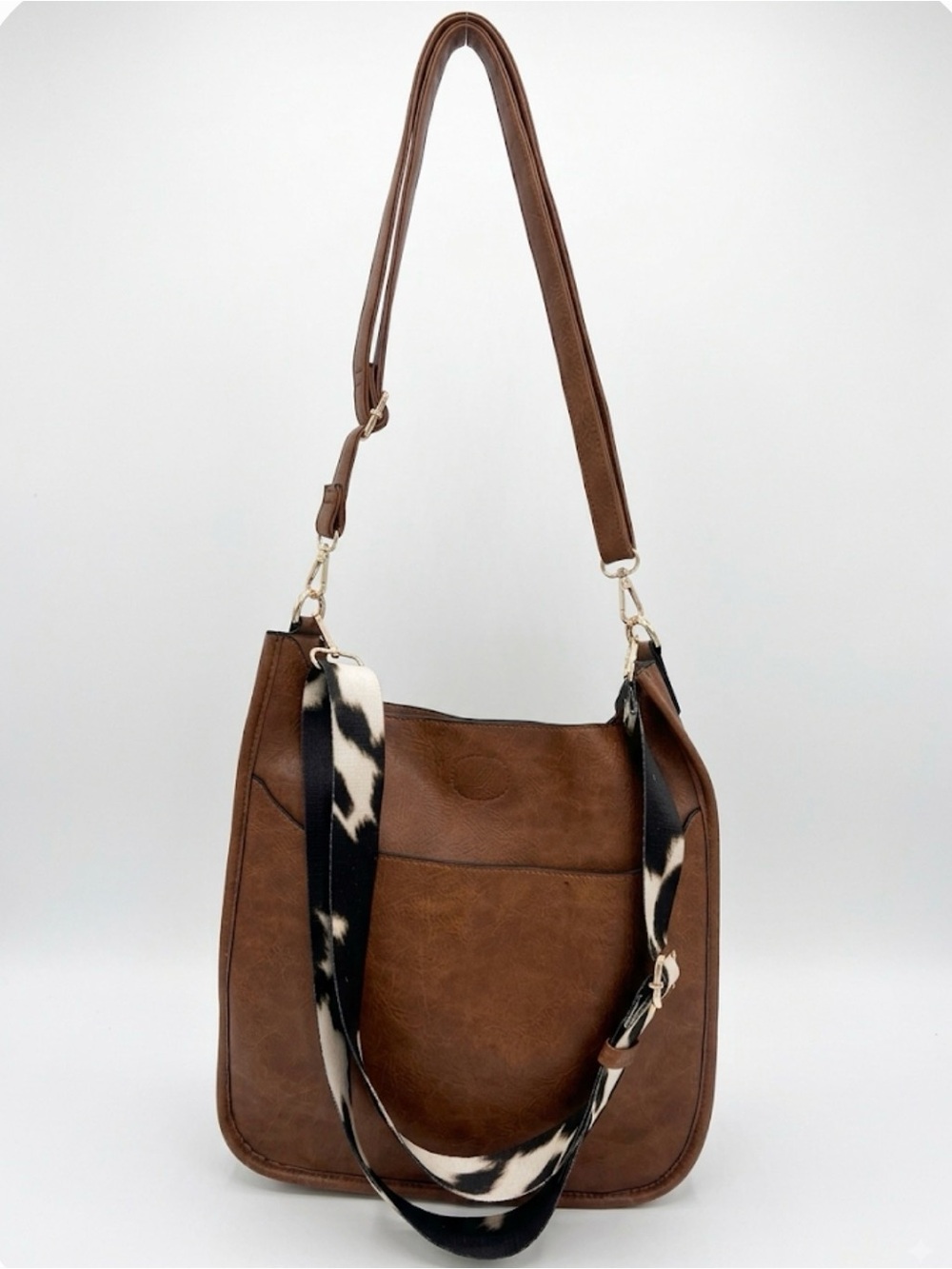 Brown Faux Leather Crossbody Bag with Trendy Cow Print Strap and Gold Hardware